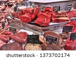 Meat store in Gothenburg Market Hall (Saluhallen), Sweden. Various meats: beef, entrecote and flank steak.