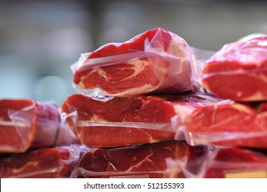Meat in vacuum packing on La Boqueria Market in Barcelona, Spain