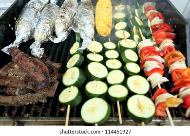 Meat and vegetable skewers on the grill. - Powered by Shutterstock