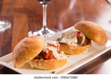 Meatball slider with red sauce and mozzarella - Shutterstock ID 1985671880