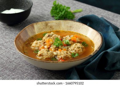 Meatball Soup In Ceramic Dish