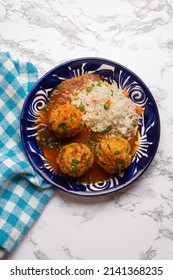 Meatballs With Chipotle Red Sauce And Rice. Traditional Mexican Food