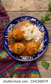 Meatballs With Chipotle Red Sauce And Rice. Traditional Mexican Food