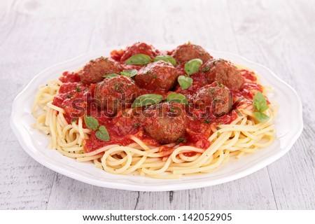 Similar – Image, Stock Photo Meatballs in tomato sauce on black tray. Above view of meat dish