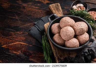 Meatless Vegetarian Meatballs From Raw Plant Based Meat With Thyme And Rosemary. Wooden Background. Top View. Copy Space.