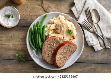 Meatloaf With Mashed Potatoes And Green Beans, Traditional Dinner Meal, Serving On A Plate