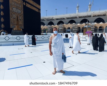 MECCA , SAUDI ARABIA , 22 Oct 2020 - Pilgrims Circle The Kaaba At Masjid Al-Haram - Umrah Fewer Muslims People Socially Distanced Corona Virus Wearing Face Mask Covid 19