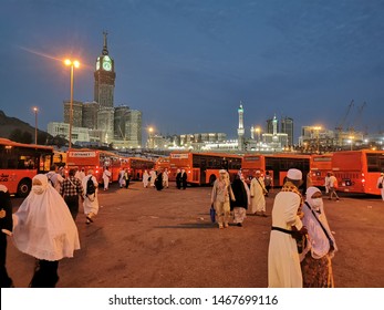 Mecca, Saudi Arabia : 31/07/2019 : Scene At Th Gaza Bus Station With Background Of Tower Clock And Masjidil Haram During Hajj Season 1440H.