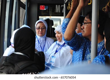 MECCA, SAUDI ARABIA - June 21 2012: Indonesian Muslims At Airport Bus In King Abdulaziz International Airport