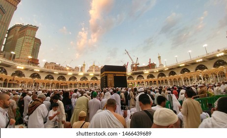 MECCA, SAUDI ARABIA - MAY 02 2018 The Holy Kaaba is the center of Islam, Located in Masjid Al Haram in Mecca. Crowd of people always walking around Kaaba making Tawaf during Umra or Hajj .