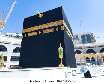 MECCA , SAUDI ARABIA , OCT/22/2020 - Pilgrims Circle The Kaaba At Masjid Al-Haram - Umrah Fewer Muslims People Socially Distanced Corona Virus Wearing Face Mask Covid 19