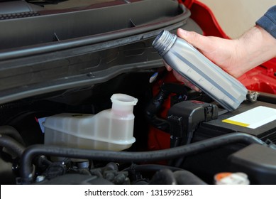 Mechanic Adds Brake Fluid To A Car