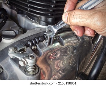 The Mechanic Is Adjusting Motorcycle Clutch Cable.