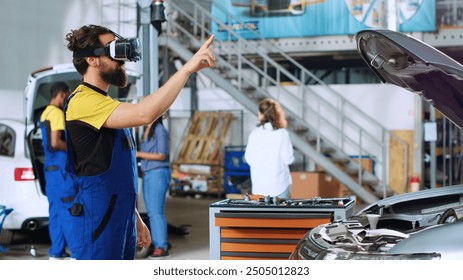 Mechanic in auto repair shop using virtual reality goggles to visualize car components in order to fix them. Repairman wearing futuristic vr headset while working on damaged vehicle - Powered by Shutterstock