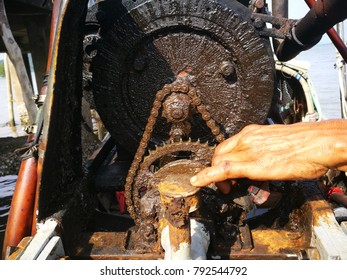 Mechanic Is Checking Engine Of Boat