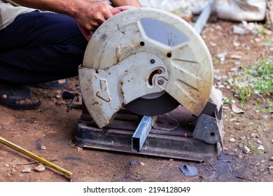 The Mechanic Was Cutting The Steel, Causing A Spark. Steel Cutting Machine