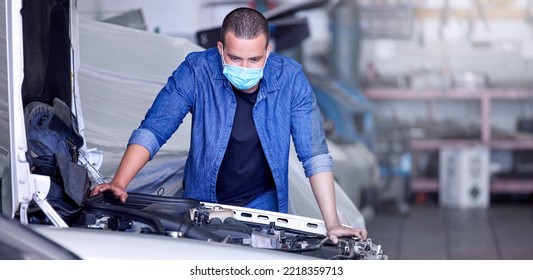 Mechanic, Engine And Car, Man With Face Mask For Covid Safety At Auto Repair Garage, Vehicle Inspection And Maintenance, Mechanical Engineering. Automobile Engineer, Car Engine Check At Workshop.