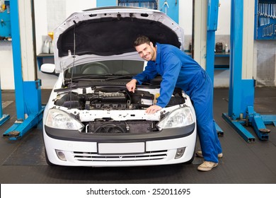 Mechanic Examining Under Hood Car Repair Stock Photo (Edit Now) 252011695