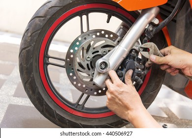 mechanic fixing motocycle  worn motorcycle drum breaks shoes - Shutterstock ID 440506927