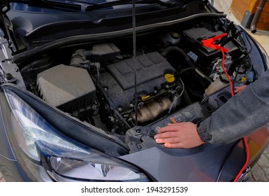 Mechanic Hands On Open Hood. Open Hood At Service Station Close-up. Car Open Bonnet Top View