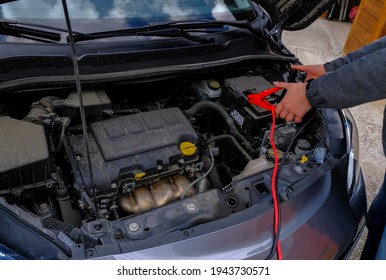 Mechanic Hands On Open Hood. Open Hood At Service Station Close-up. Car Open Bonnet Top View