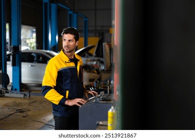mechanic installing wheel alignment sensor by machine caliper. Hispanic man professional mechanic repairs car in garage. Car maintenance and auto service garage concept