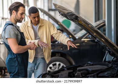 Mechanic Looking Into Hood Customer Telling Stock Photo 2179939897 ...