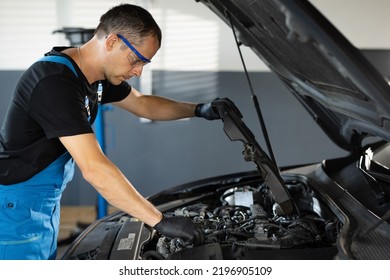 9,654 Open hood man Images, Stock Photos & Vectors | Shutterstock