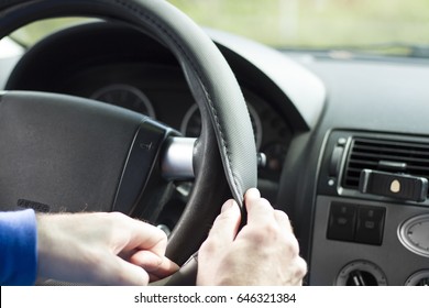 The Mechanic Puts On The Overlay On The Steering Wheel Of The Car. Renewal Of Car Interior, Steering Wheel Cover.