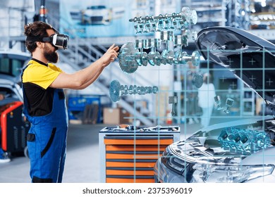 Mechanic in repair shop using augmented reality holograms to check car performance parameters during maintenance. Garage employee using futuristic vr headset to examine damaged vehicle - Powered by Shutterstock