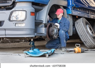 Mechanic Repair Truck Is On The Jack