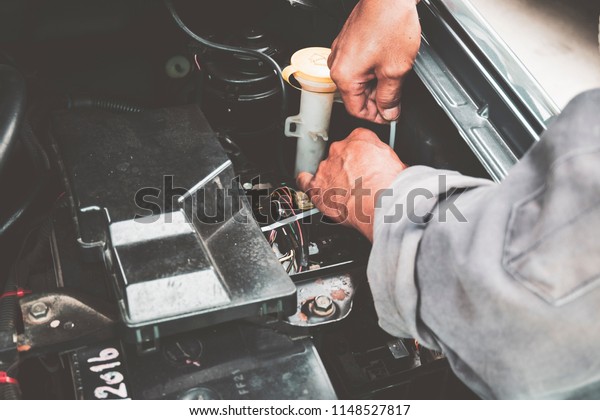mechanic in repairing car and check the engine daily\
before use, 