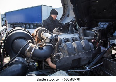 Mechanic repairing truck