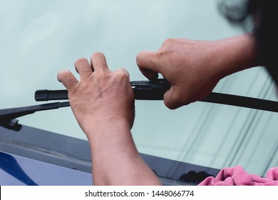 Mechanic Replace Windshield Wipers On Car. Replacing Wiper Blades
Change Cars Wiper Blades. Technician Man Changing Windshield Wipers Blades On Car.