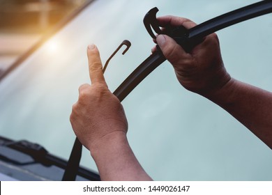 Mechanic Replace Windshield Wipers On Car. Replacing Wiper Blades
Change Cars Wiper Blades. Technician Man Changing Windshield Wipers Blades On Car.