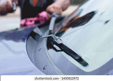 Mechanic Replace Windshield Wipers On Car. Replacing Wiper Blades
Change Cars Wiper Blades. Technician Man Changing Windshield Wipers Blades On Car.