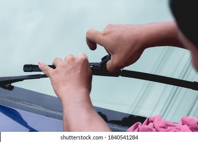 Mechanic Replace Windshield Wipers On Car. Replacing Wiper Blades
Change Cars Wiper Blades. Technician Man Changing Windshield Wipers Blades On Car.