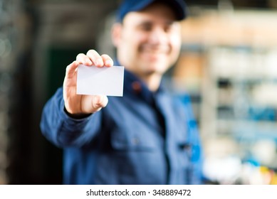 Mechanic Showing A Blank Card