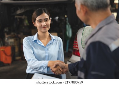 Mechanic Technician Making Handshake Deal With Business Customer At Auto Car Garage Service, Workshop Occupation For Automobile Maintenance Repair, Adult Industry Worker Greeting For Client Agreement