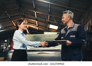 Mechanic Technician Making Handshake Deal With Business Customer At Auto Car Garage Service, Workshop Occupation For Automobile Maintenance Repair, Adult Industry Worker Greeting For Client Agreement