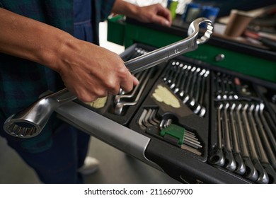 Mechanic Toolbox With Metal Equipments In Aircraft Hangar