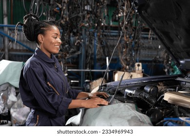 mechanic using laptop computer for checking and fixing a car in automobile repair shop - Powered by Shutterstock - Get 15% off with code: PIKWIZARD15