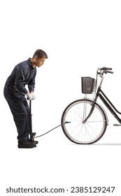 Mechanic using a manual pump for a flat front tire of a bicycle isolated on white background