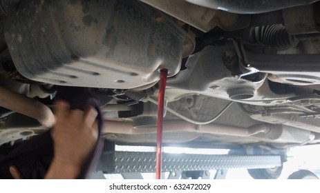 Mechanic at work with tools.