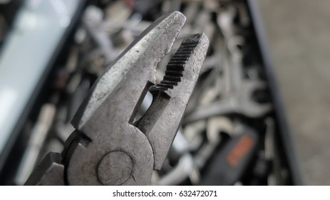 Mechanic at work with tools.