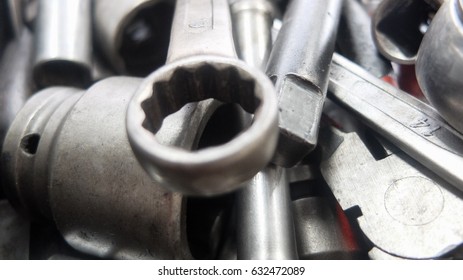 Mechanic at work with tools.