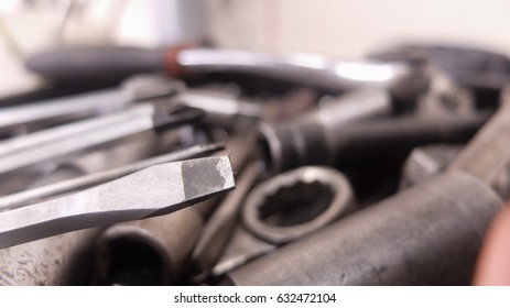 Mechanic at work with tools.