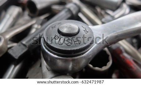 Mechanic at work with tools.