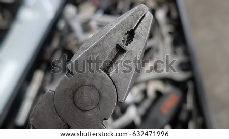 Mechanic at work with tools.