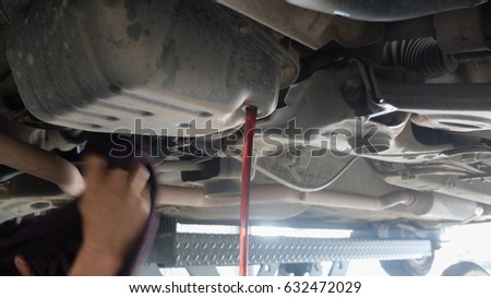 Mechanic at work with tools.